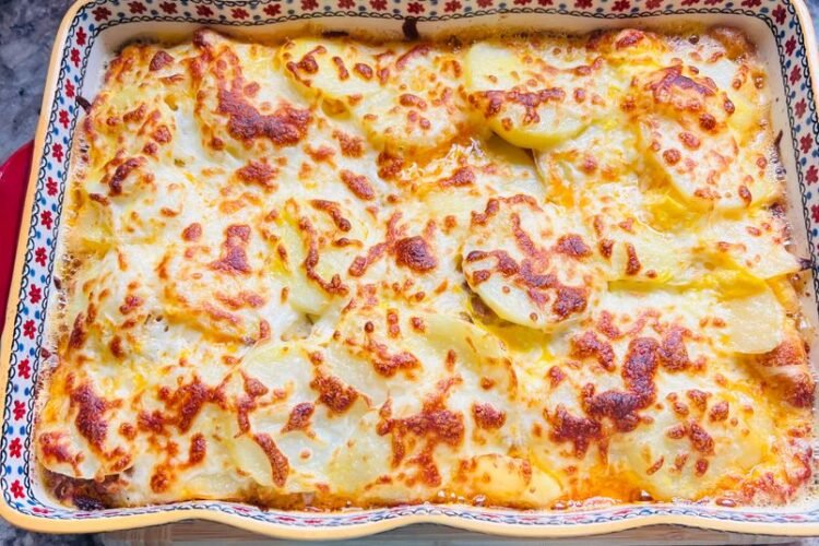 Baked Raclette with Potatoes and Charcuterie