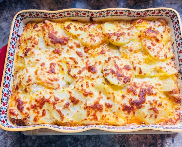 Baked Raclette with Potatoes and Charcuterie