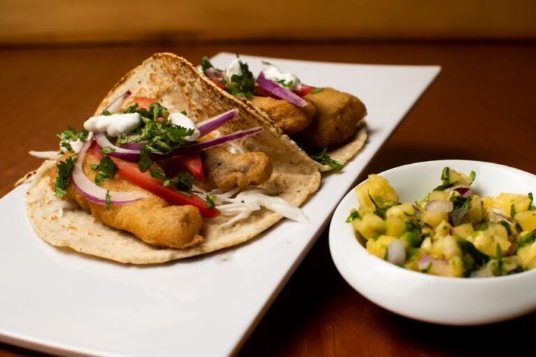 Beer-Battered Baja Fish Tacos with Chipotle Crema and Charred Lime Slaw