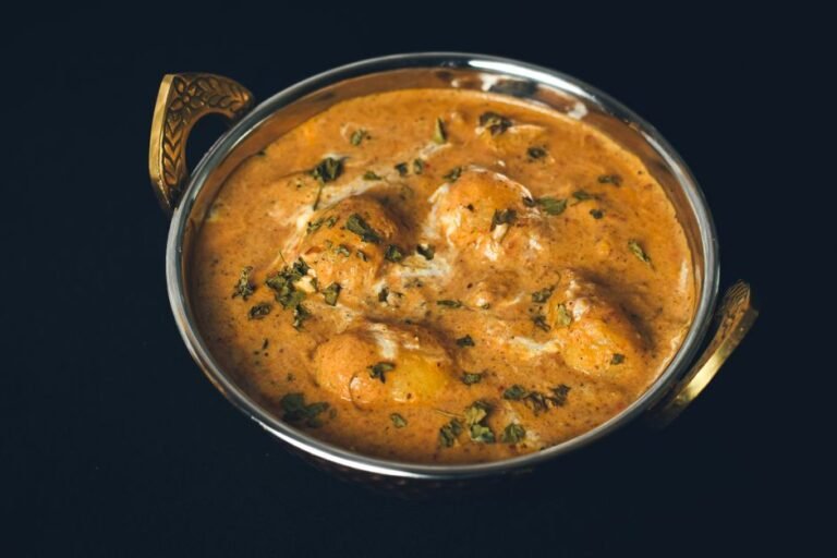 Bengali Puffed Flatbread with Spiced Potato Curry