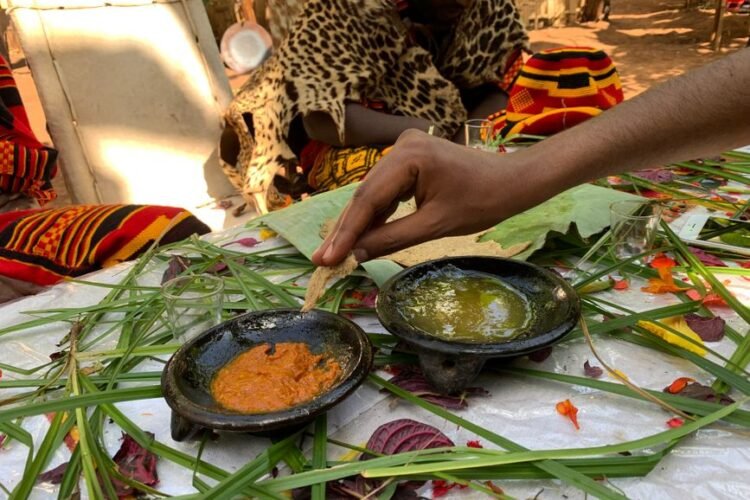 Cameroonian Pounded Cocoyam Wrapped in Leaves with Pepper Sauce
