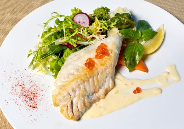 Charred Barramundi with Lemon Myrtle Butter, Warrigal Greens and Macadamia Crumb