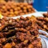 Charred Suya Chicken Thighs with Jollof Rice and Caramelized Plantains