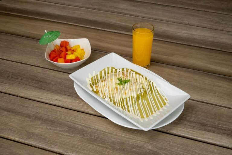Chicken Enchiladas in Creamy Roasted Tomatillo Sauce