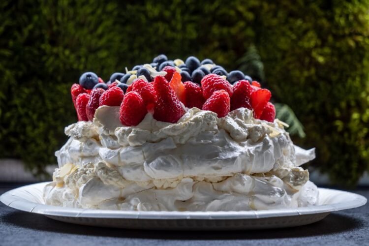 Classic Australian Pavlova with Whipped Cream and Berries
