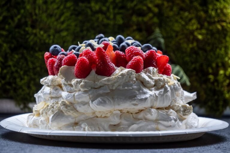 Classic Australian Pavlova with Whipped Cream and Berries