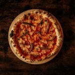 Classic Neapolitan Pizza with Anchovies, Capers, and Oregano