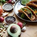 Crispy Chipotle Shrimp Tacos with Charred Corn-Jalapeño Relish and Avocado-Lime Crema