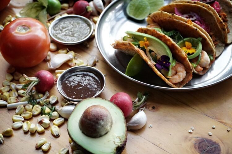 Crispy Chipotle Shrimp Tacos with Charred Corn-Jalapeño Relish and Avocado-Lime Crema