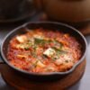 Crispy Tortillas in Spicy Red Chile Sauce with Eggs