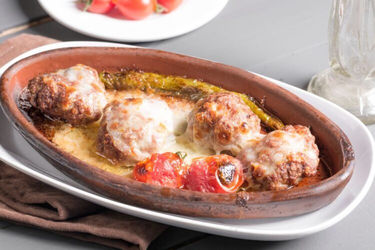 Greek Baked Soutzoukakia Meatballs in Tomato Sauce