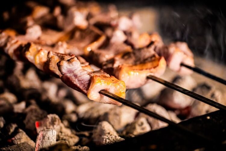 Greek Lamb Souvlaki Skewers with Charred Lemon, Mint Yogurt, and Pearl Couscous