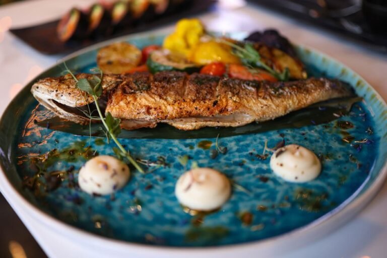 Grilled Snapper with Senegalese Onion-Lime Sauce over Herbed Cassava Couscous