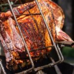 Hangi-Style Slow-Roasted Lamb Shoulder with Smoked Kumara and Charred Silverbeet