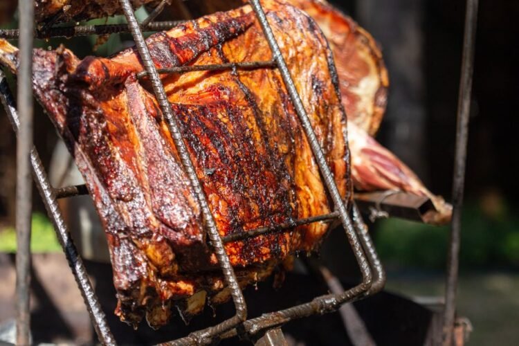 Hangi-Style Slow-Roasted Lamb Shoulder with Smoked Kumara and Charred Silverbeet