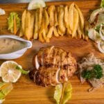Ivorian Yassa Chicken with Charred Onions and Lemon