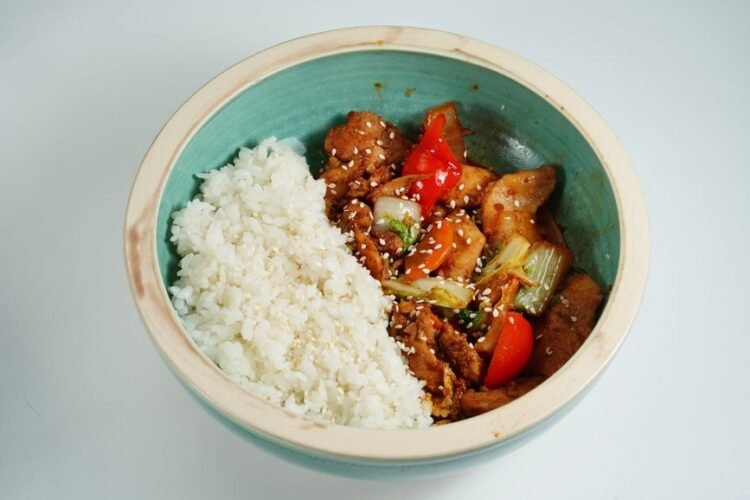 Korean Gochujang-Glazed Chicken Thighs with Sesame Rice, Charred Bok Choy, and Quick-Pickled Daikon