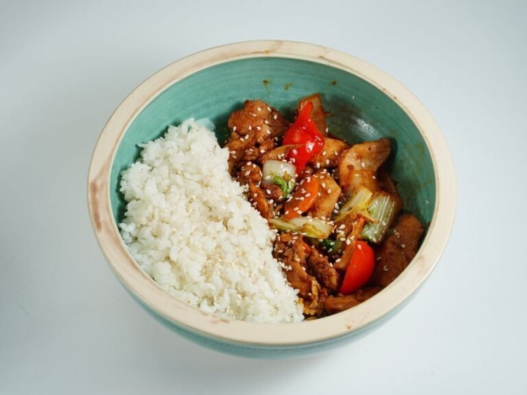 Korean Gochujang-Glazed Chicken Thighs with Sesame Rice, Charred Bok Choy, and Quick-Pickled Daikon