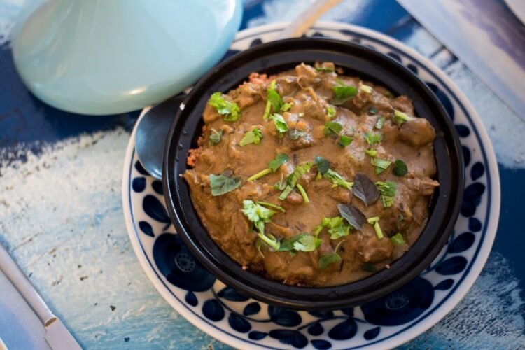 Moroccan Beef Cheek Tagine with Pomegranate Molasses and Saffron Pearl Couscous
