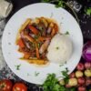 Peruvian Beef Stir-Fry with French Fries and Rice