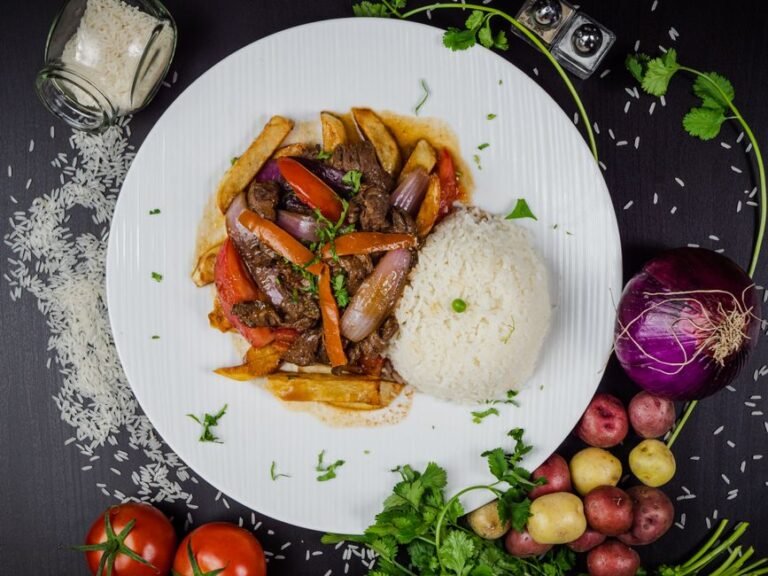Peruvian Beef Stir-Fry with French Fries and Rice