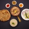 Punjabi Mustard Greens Curry with Cornmeal Flatbread