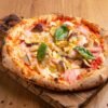 Roman-Style Pizza with Ham, Mushrooms, Artichokes, Olives, and Egg