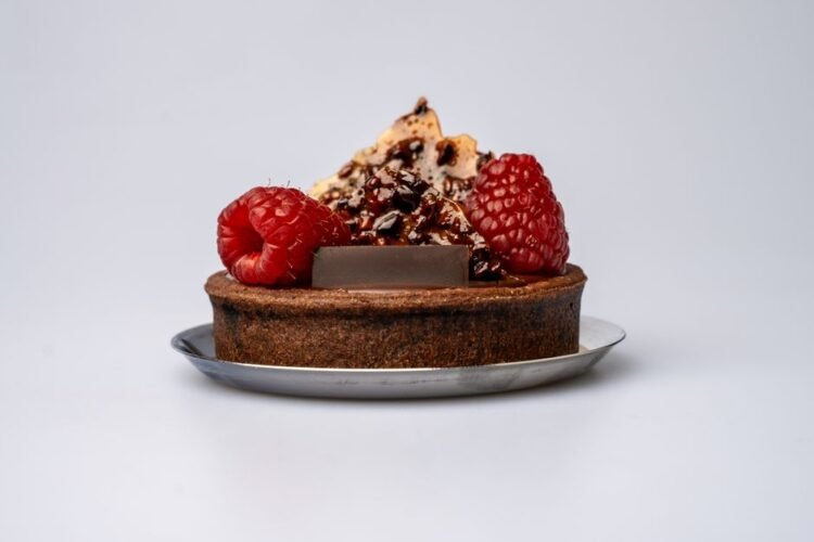 Salted Butter Caramel Chocolate Tart with Hazelnut Praline