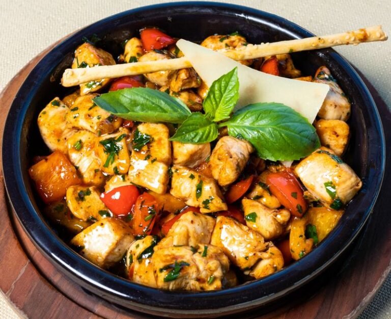 Sicilian-Style Grilled Chicken and Farro Bowl with Sun-Dried Tomato Pesto and Charred Eggplant