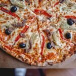 Sicilian-Style Thick Pizza with Tomato, Onions, and Anchovies