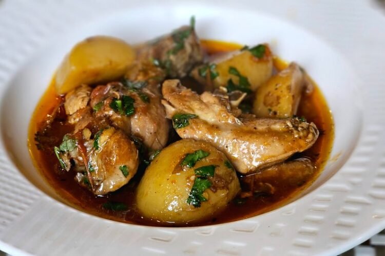 Slow-Simmered Chicken Wat with Hard-Boiled Eggs, Lacinato Kale, and Warm Ginger Oil