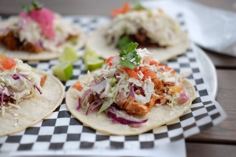 Smoky Chicken Tinga Tacos with Charred Corn-Poblano Slaw and Crispy Cheese Skirt