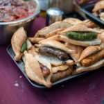 South African Boerewors Roll with Caramelized Onions