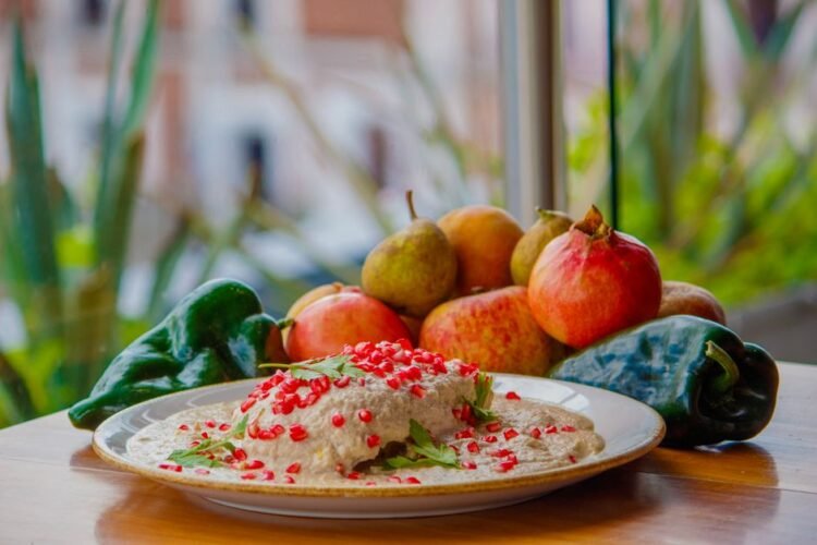 Stuffed Poblano Peppers with Walnut Cream and Pomegranate (Chiles en Nogada)