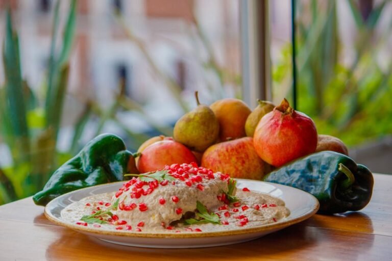 Stuffed Poblano Peppers with Walnut Cream and Pomegranate (Chiles en Nogada)