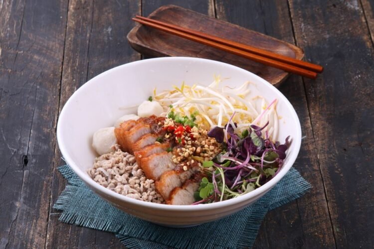 Thai Crispy Pork Belly Noodle Bowl with Coconut Lime Broth