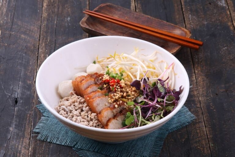 Thai Crispy Pork Belly Noodle Bowl with Coconut Lime Broth
