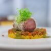 Traditional Algerian Lamb Couscous with Spiced Vegetables and Berber Pepper Sauce