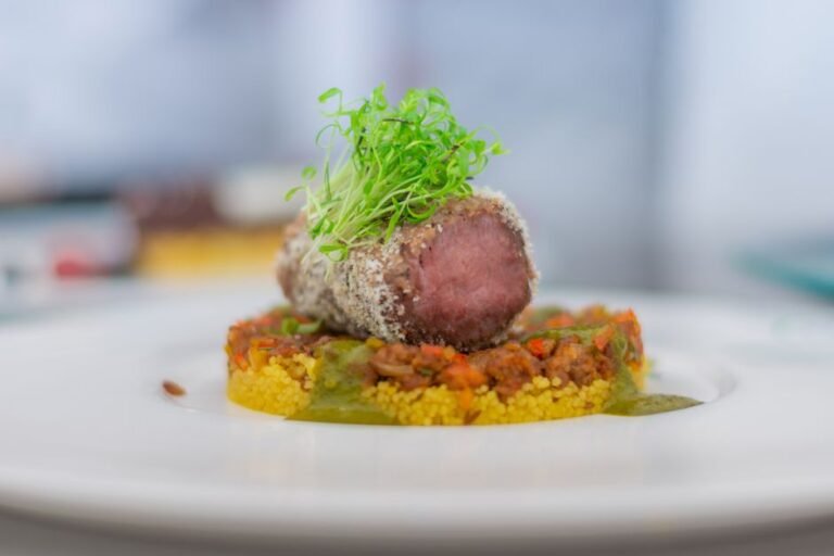 Traditional Algerian Lamb Couscous with Spiced Vegetables and Berber Pepper Sauce