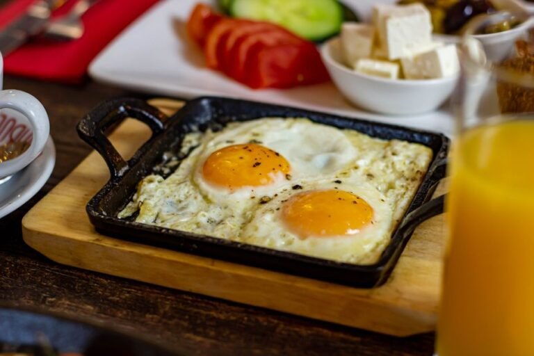 Tunisian Baked Eggs with Sweet Peppers and Harissa