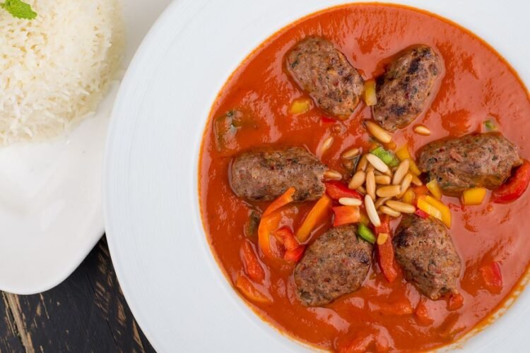 Tunisian Spiced Meat Patties in Harissa-Tomato Sauce