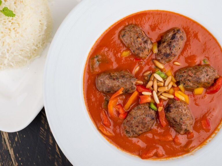 Tunisian Spiced Meat Patties in Harissa-Tomato Sauce