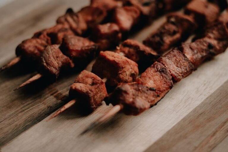 Ugandan Char-Grilled Pork Skewers with Kachumbari and Cassava Fries