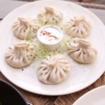 Afghan Leek Dumplings with Garlic Yogurt and Spiced Meat Sauce