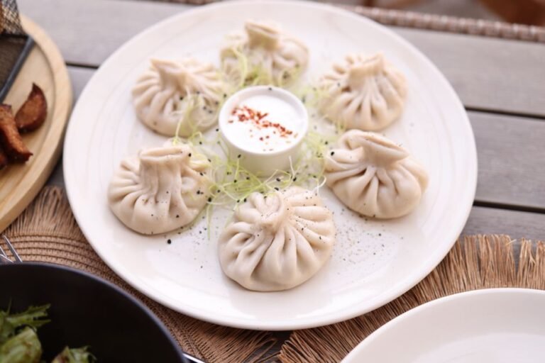 Afghan Leek Dumplings with Garlic Yogurt and Spiced Meat Sauce