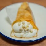 Bengali Sweet Rice Crepes with Coconut-Jaggery Filling