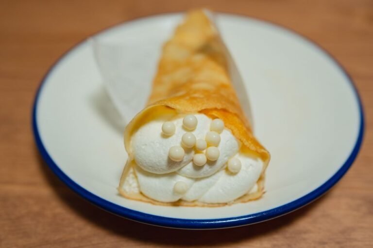 Bengali Sweet Rice Crepes with Coconut-Jaggery Filling