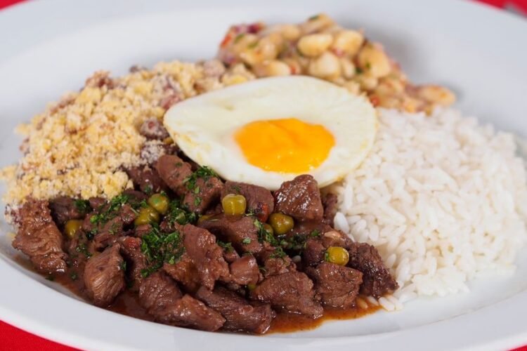 Bolivian Breaded Beef Cutlet over Rice with Fried Egg and Tomato-Onion Salsa