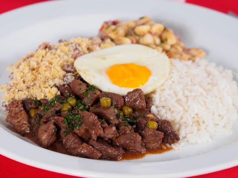 Bolivian Breaded Beef Cutlet over Rice with Fried Egg and Tomato-Onion Salsa