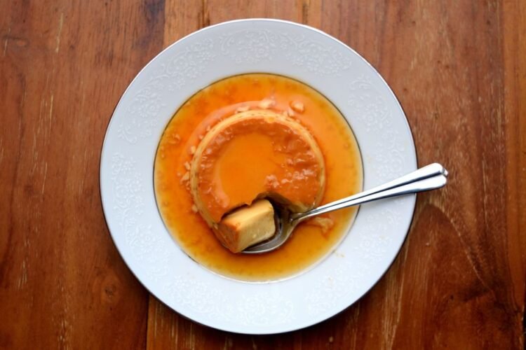 Classic British Spotted Dick Steamed Pudding with Warm Vanilla Custard